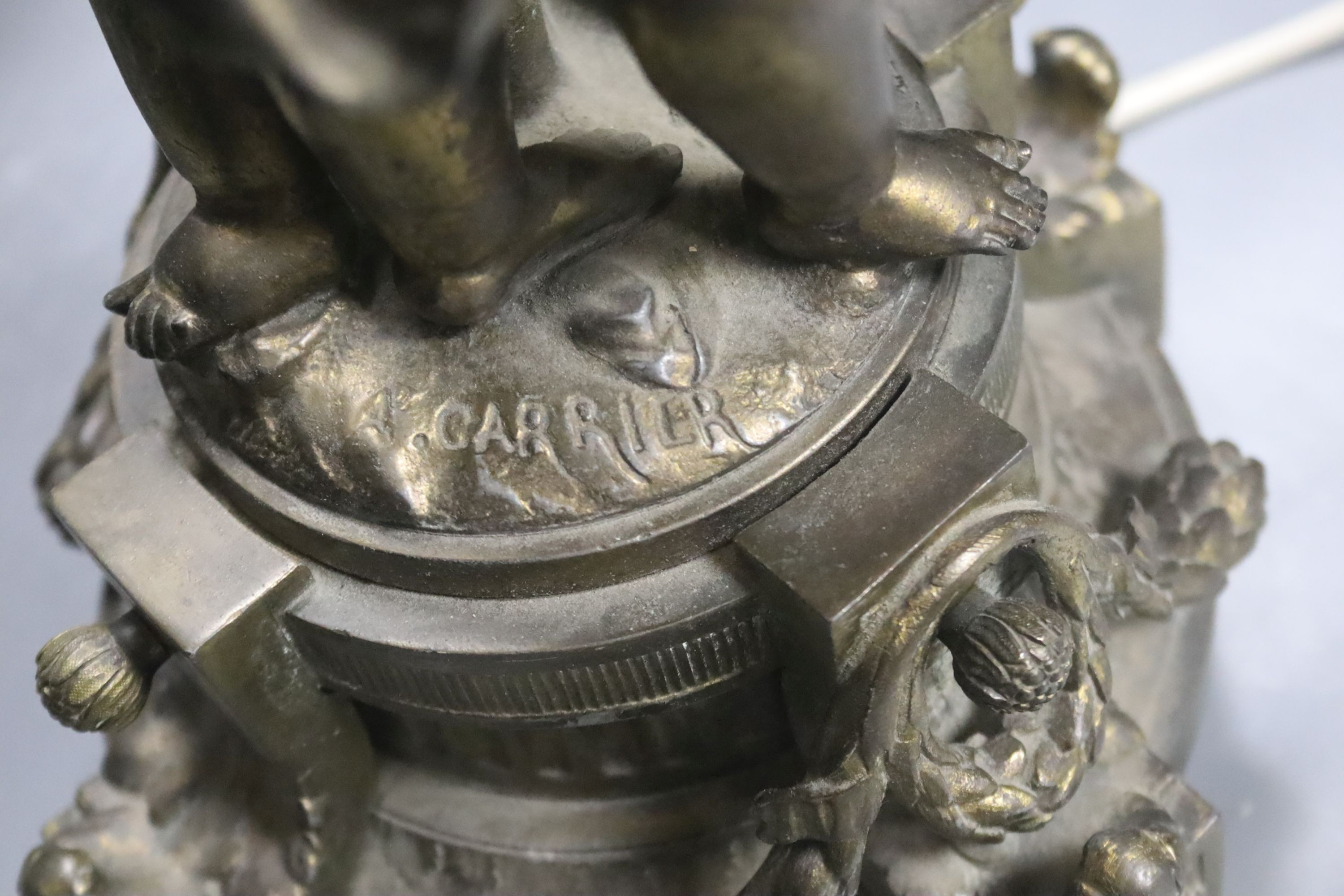 A gilt metal cherubic table lamp, signed, overall height 50cm